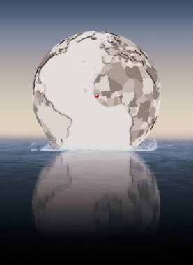 Gine-Bissau içinde kırmızı su içerisinde yüzen dünya üzerinde. 3D çizim.