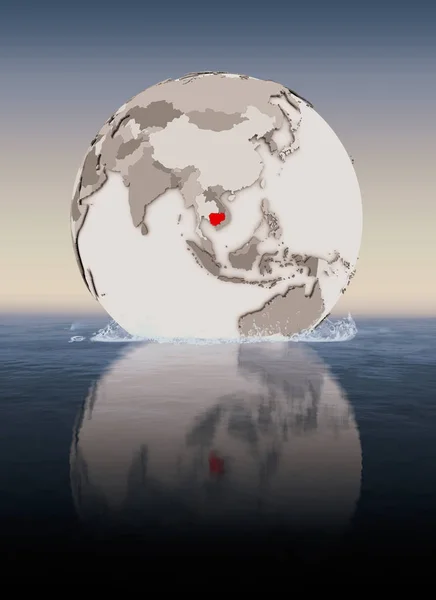 Cambodia In red on globe floating in water. 3D illustration.