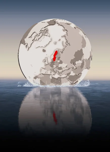 Sweden In red on globe floating in water. 3D illustration.