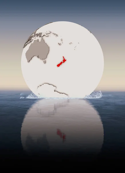 New Zealand In red on globe floating in water. 3D illustration.