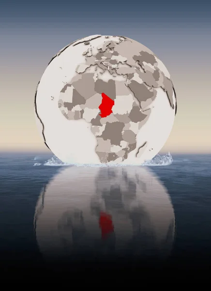 Chad In red on globe floating in water. 3D illustration.
