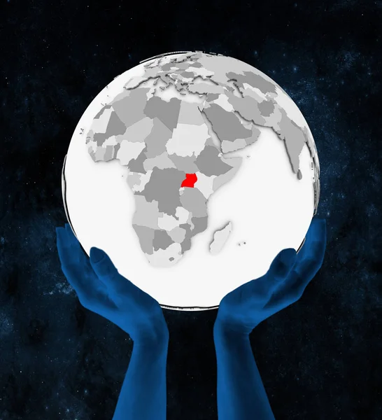 Ουγκάντα Κόκκινο Χρώμα Στο Λευκό Globe Πραγματοποιήθηκε Στα Χέρια Στο — Φωτογραφία Αρχείου