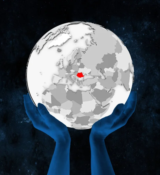 Uzayda Elinde Romanya Içinde Kırmızı Beyaz Küre Üzerinde Tutulan Çizim — Stok fotoğraf