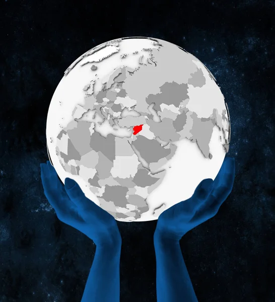 Syyria Punaisella Valkoisella Pallolla Pidetään Käsissä Avaruudessa Kuva — kuvapankkivalokuva