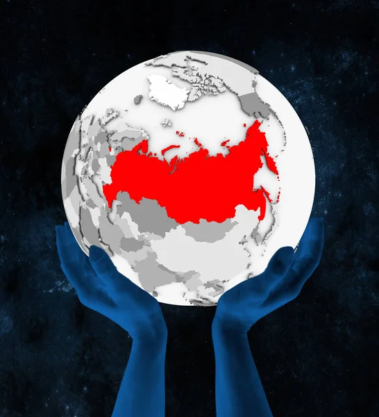 Russia In red on white globe held in hands in space. 3D illustration.