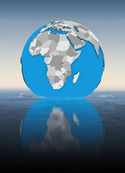 Burundi on globe floating in water. 3D illustration.