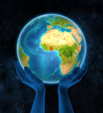 Uzayda elinde kırmızı küre üzerinde Gana'da düzenlenen. 3D çizim.