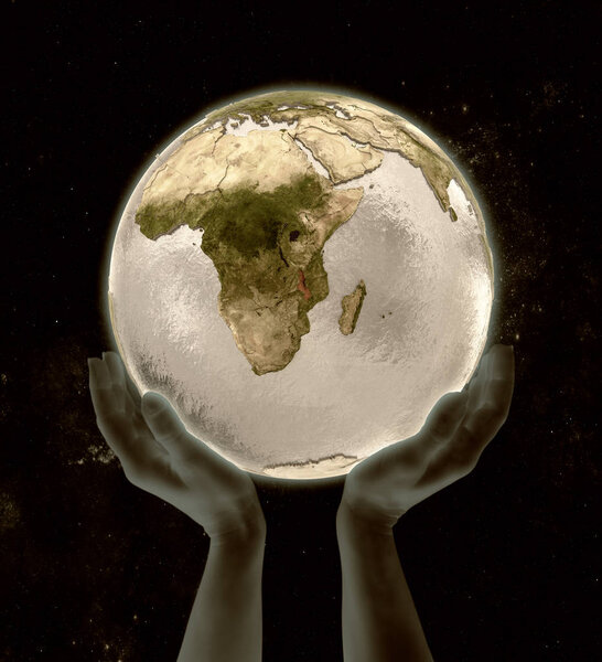 Malawi on globe in hands in space. 3D illustration.