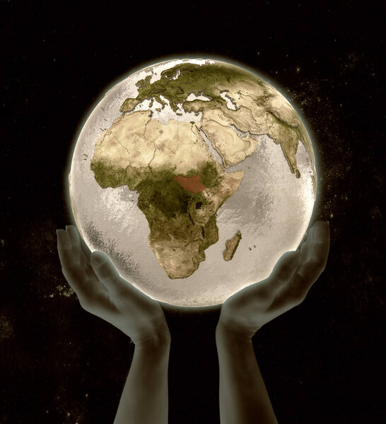 South Sudan on globe in hands in space. 3D illustration.