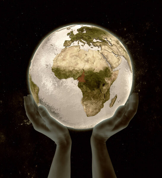 Cameroon on globe in hands in space. 3D illustration.