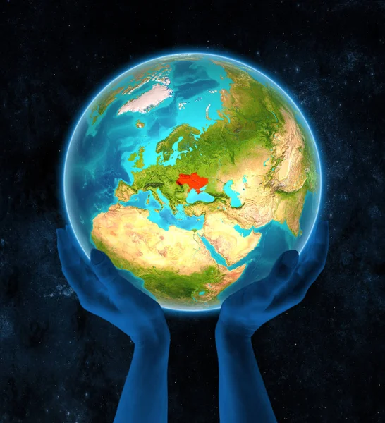 Ukraine in red on globe held in hands in space. 3D illustration.
