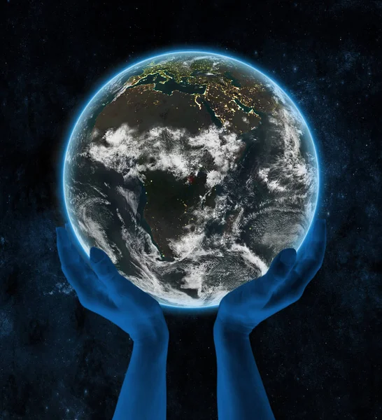 布隆迪在地球上的夜晚在太空中的手 — 图库照片