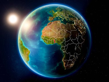 Günbatımı red Planet Earth görünür ülke sınırları ile vurgulanmış Togo yukarıda. 3D çizim. Nasa tarafından döşenmiş bu görüntü unsurları.