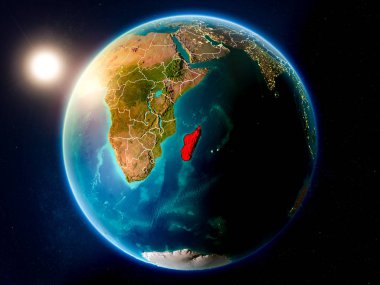 Günbatımı red Planet Earth görünür ülke sınırları ile vurgulanmış Madagaskar yukarıda. 3D çizim. Nasa tarafından döşenmiş bu görüntü unsurları.