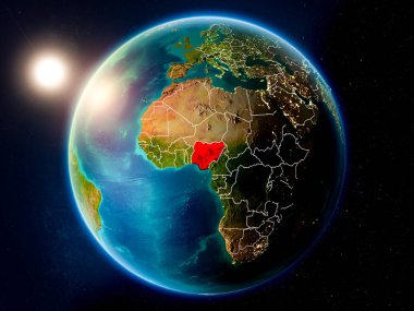 Günbatımı red Planet Earth görünür ülke sınırları ile vurgulanmış Nijerya yukarıda. 3D çizim. Nasa tarafından döşenmiş bu görüntü unsurları.