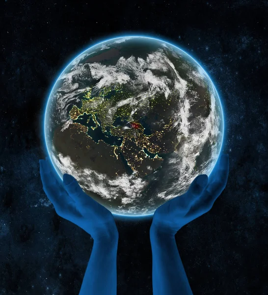 空間での手で夜 地球のジョージア イラストレーション — ストック写真