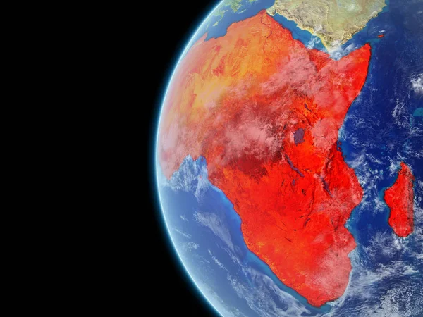 Africa from space on model of planet Earth with very detailed planet surface and clouds. Continent highlighted in red. 3D illustration. Elements of this image furnished by NASA.