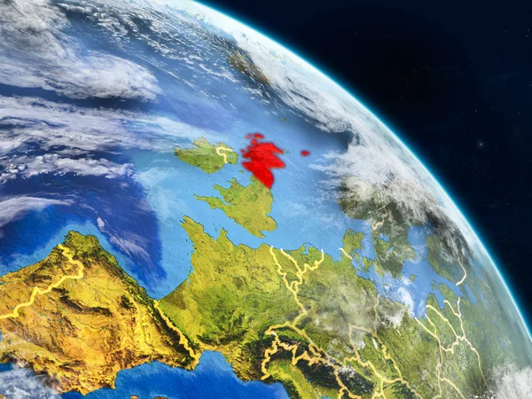 Scotland from space on realistic model of planet Earth with country borders and detailed planet surface and clouds. 3D illustration. Elements of this image furnished by NASA.