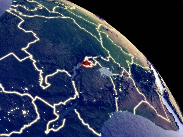 Burundi at night from orbit. Plastic planet surface with visible city lights. 3D illustration. Elements of this image furnished by NASA.