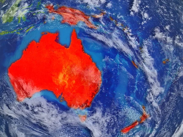 Australia on realistic model of planet Earth with very detailed planet surface and clouds. Continent highlighted in red colour. 3D illustration. Elements of this image furnished by NASA.