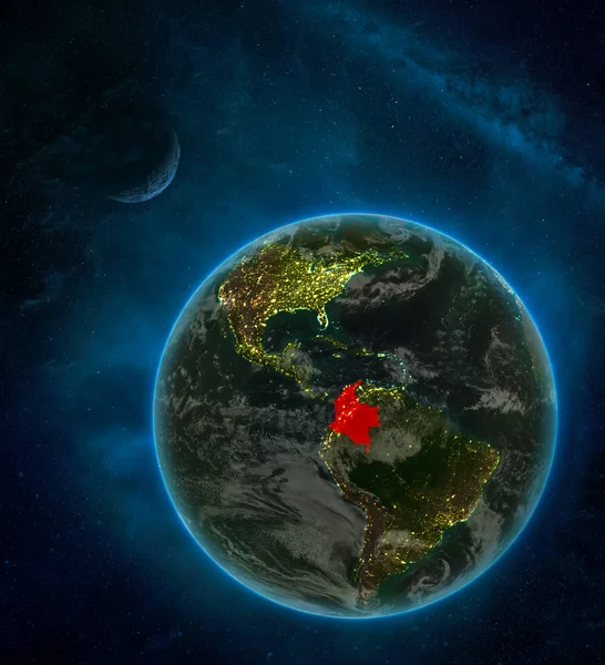 Colombia from space on Earth at night surrounded by space with Moon and Milky Way. Detailed planet with city lights and clouds. 3D illustration. Elements of this image furnished by NASA.