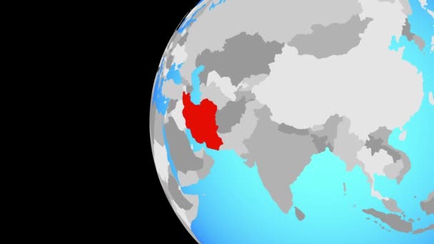 Zamknięcie w sprawie Iranu na niebieskim globie — Wideo stockowe