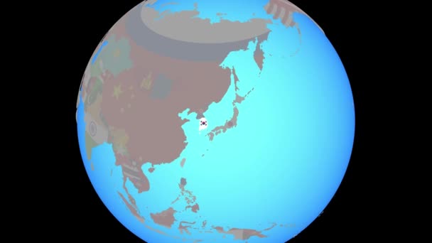 Zoom naar Zuid-Korea met vlag op kaart — Stockvideo