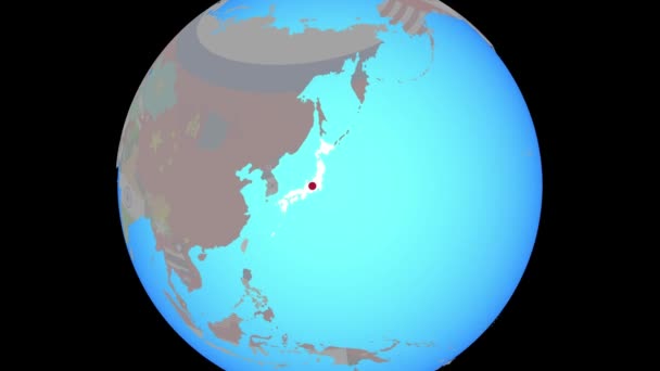 Εστίαση στην Ιαπωνία με σημαία στο χάρτη — Αρχείο Βίντεο