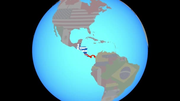 Zoom vers Amérique centrale avec drapeaux sur la carte — Video