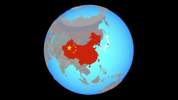 Збільшити масштаб до Східної Азії з прапорами на карті — стокове відео