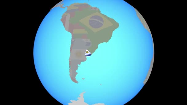 Zoom a Uruguay con bandera en el mapa — Vídeos de Stock