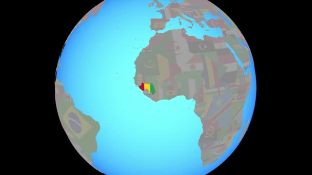 Zoom a Guinea con la bandera en el mapa — Vídeo de stock