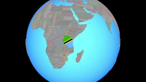Zoom naar Tanzania met vlag op kaart — Stockvideo