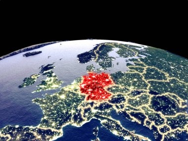 Almanya uzayda dünya gezegeninde gece parlak şehir ışıkları ile. Gerçek dağlar ile ayrıntılı plastik gezegen yüzeyi. 3d illüstrasyon. Nasa tarafından döşenmiş bu görüntünün elemanları.