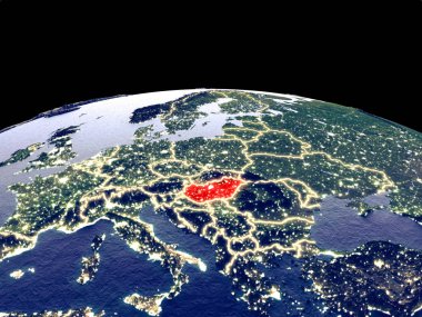 Macaristan uzaydan dünya gezegeninde gece parlak şehir ışıkları ile. Gerçek dağlar ile ayrıntılı plastik gezegen yüzeyi. 3d illüstrasyon. Nasa tarafından döşenmiş bu görüntünün elemanları.