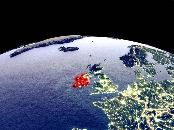 Ireland from space on planet Earth at night with bright city lights. Detailed plastic planet surface with real mountains. 3D illustration. Elements of this image furnished by NASA.