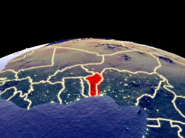 Benin from space on planet Earth at night with bright city lights. Detailed plastic planet surface with real mountains. 3D illustration. Elements of this image furnished by NASA.