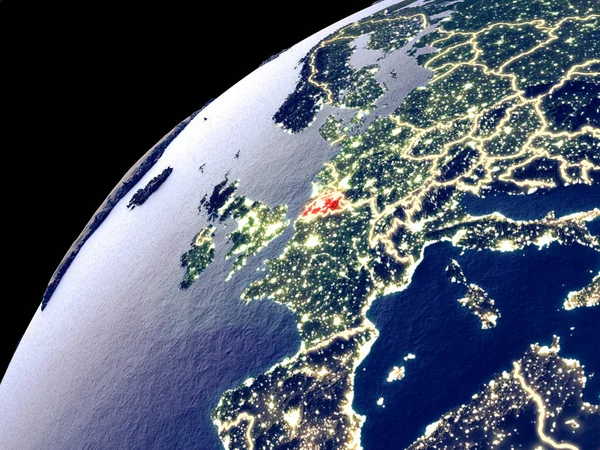 Satellite view of Belgium on Earth with city lights. Extremely detailed plastic planet surface with real mountains. 3D illustration. Elements of this image furnished by NASA.