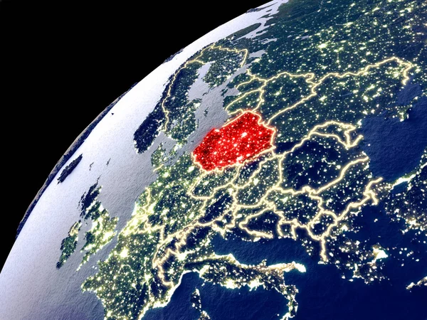 Satellite view of Poland on Earth with city lights. Extremely detailed plastic planet surface with real mountains. 3D illustration. Elements of this image furnished by NASA.