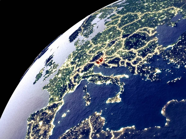 Satellite view of Slovenia on Earth with city lights. Extremely detailed plastic planet surface with real mountains. 3D illustration. Elements of this image furnished by NASA.