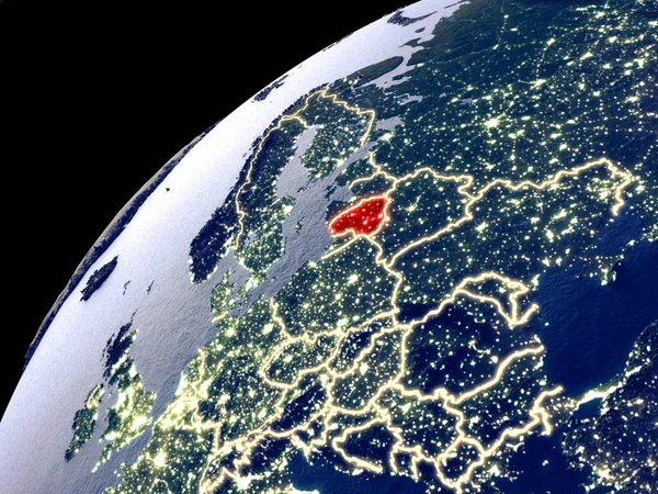 Satellite view of Lithuania on Earth with city lights. Extremely detailed plastic planet surface with real mountains. 3D illustration. Elements of this image furnished by NASA.