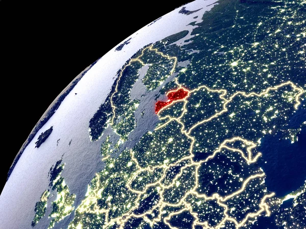 Satellite view of Latvia on Earth with city lights. Extremely detailed plastic planet surface with real mountains. 3D illustration. Elements of this image furnished by NASA.