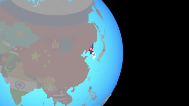 Збільшення до Кореї з прапорами на земній кулі — стокове відео