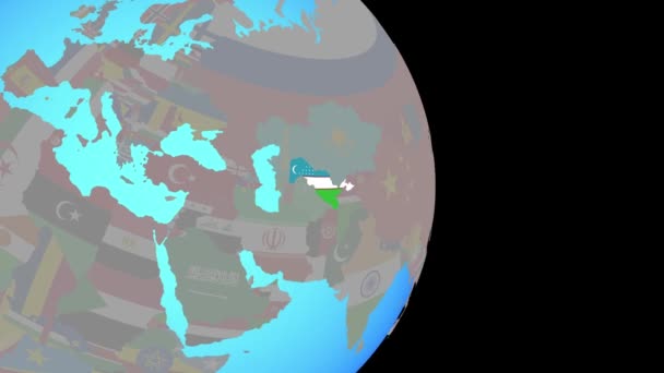 Zoom to Uzbekistan with flag on globe — Stock Video