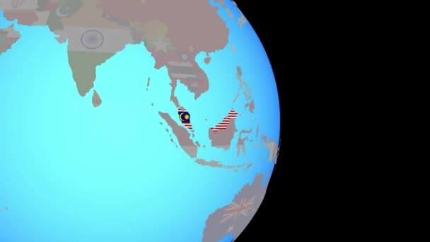 Zoom to Malaysia with flag on globe — Stock Video