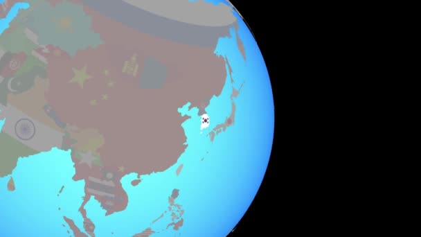 Zoom to South Korea with flag on globe — Stock Video