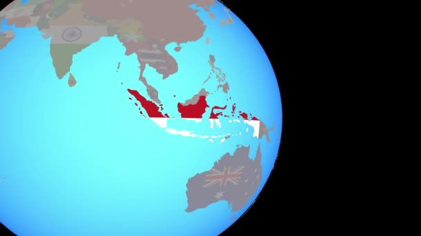 Přiblížit Indonésii s vlajkou na zeměkouli — Stock video