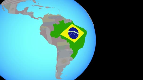 Поездка в Бразилию с флагом на глобусе — стоковое видео