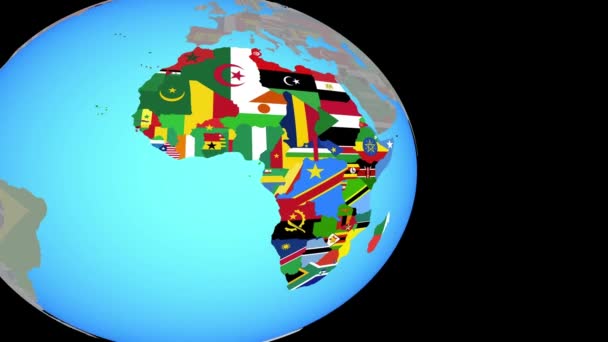 Zoom vers l'Afrique avec des drapeaux sur le globe — Video