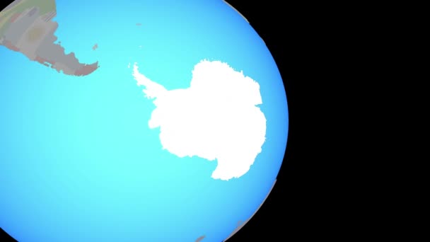Zooma in på Antarktis med flagga på jorden — Stockvideo